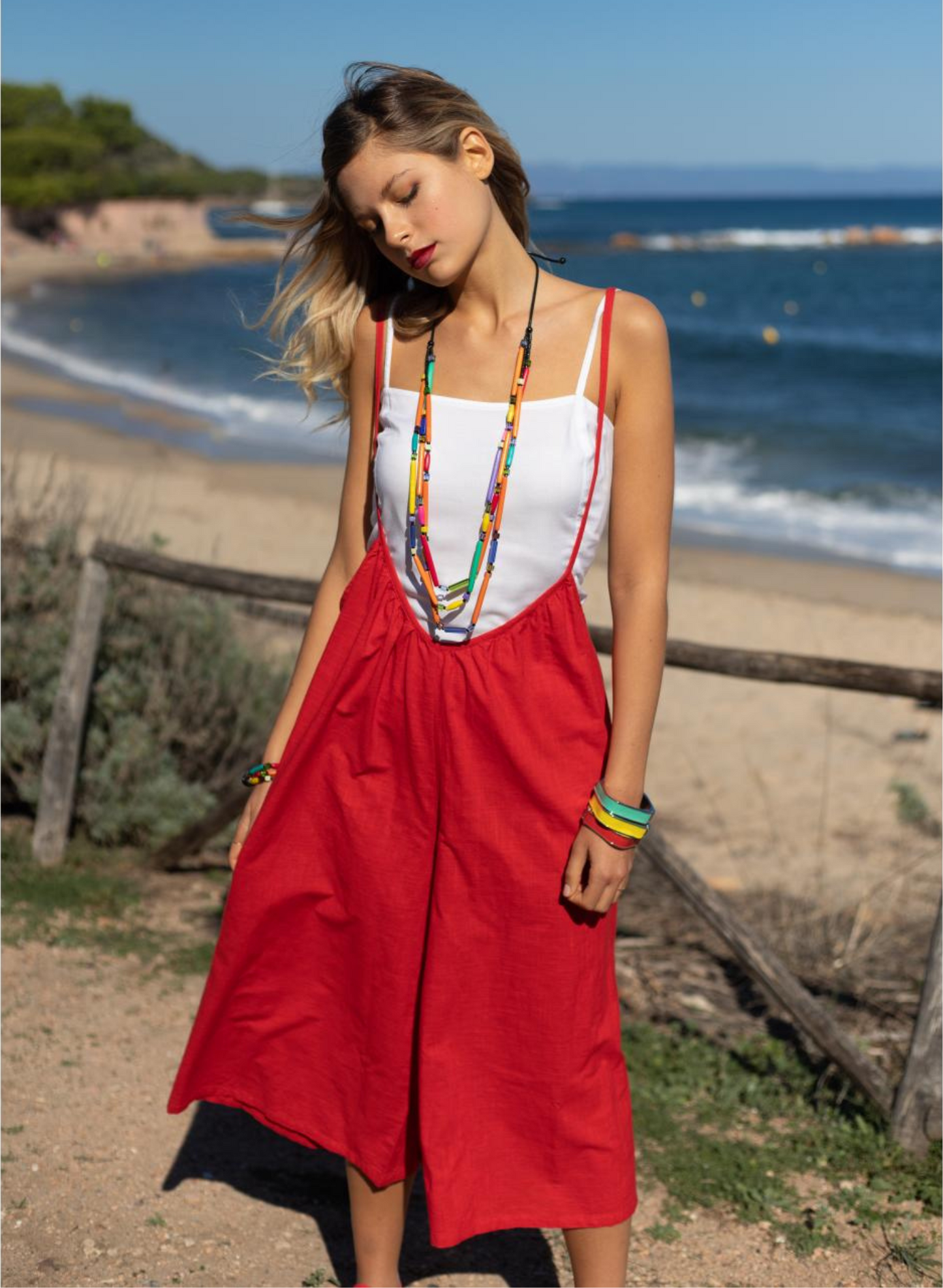 Tuta rossa cropped gamba larga