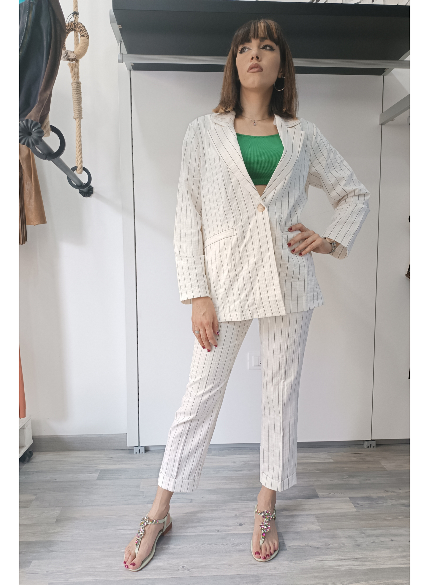 Pantaloni gessati fondo panna