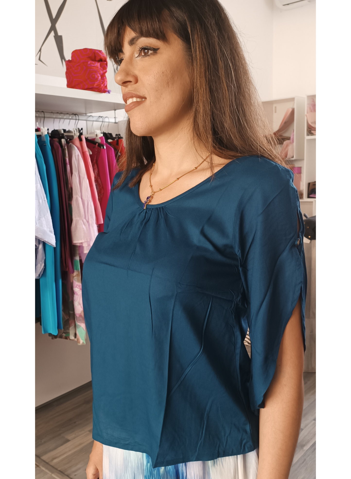 Blusa colore ottanio