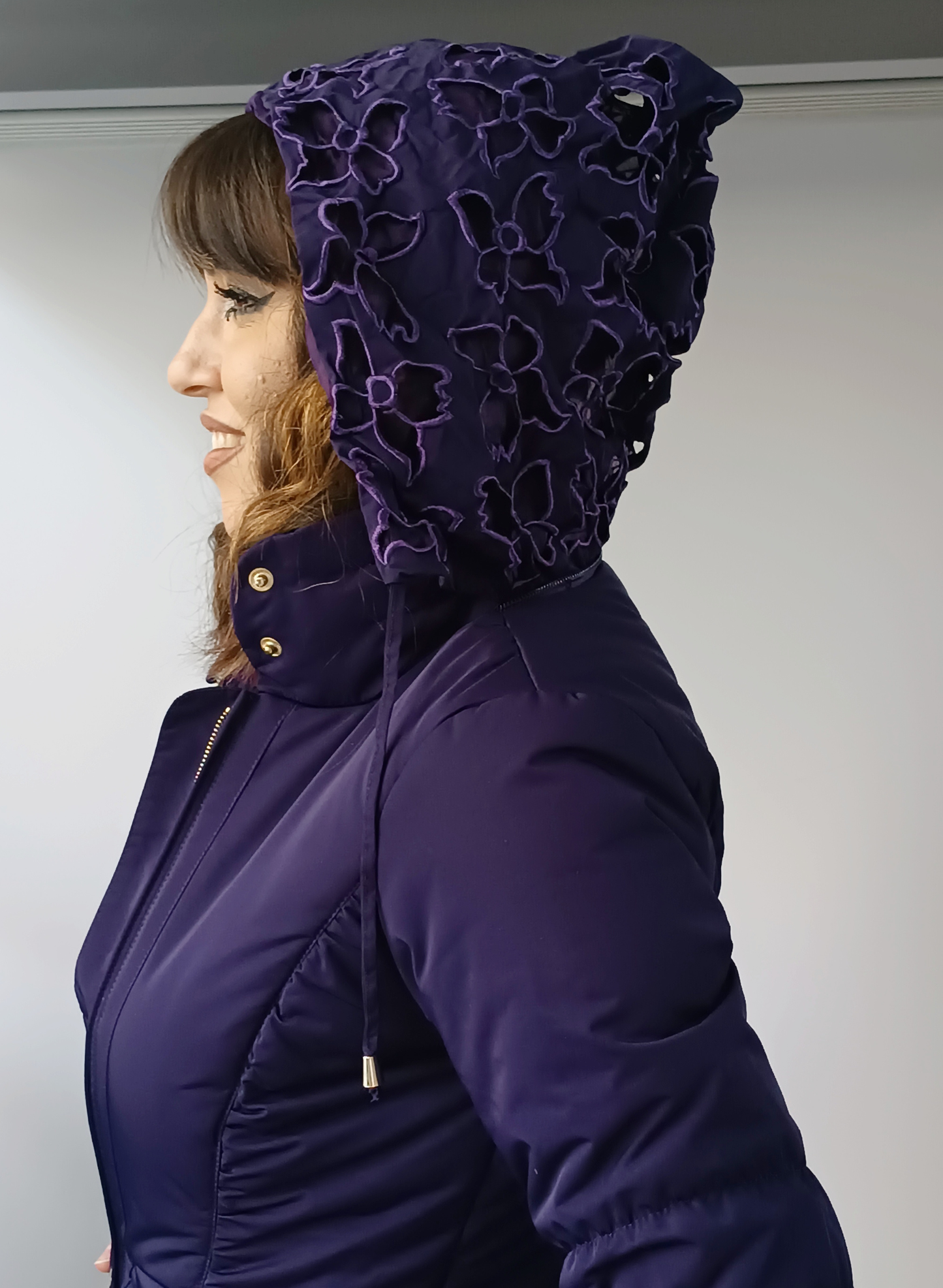 Piumino con cappuccio "colore melanzana"