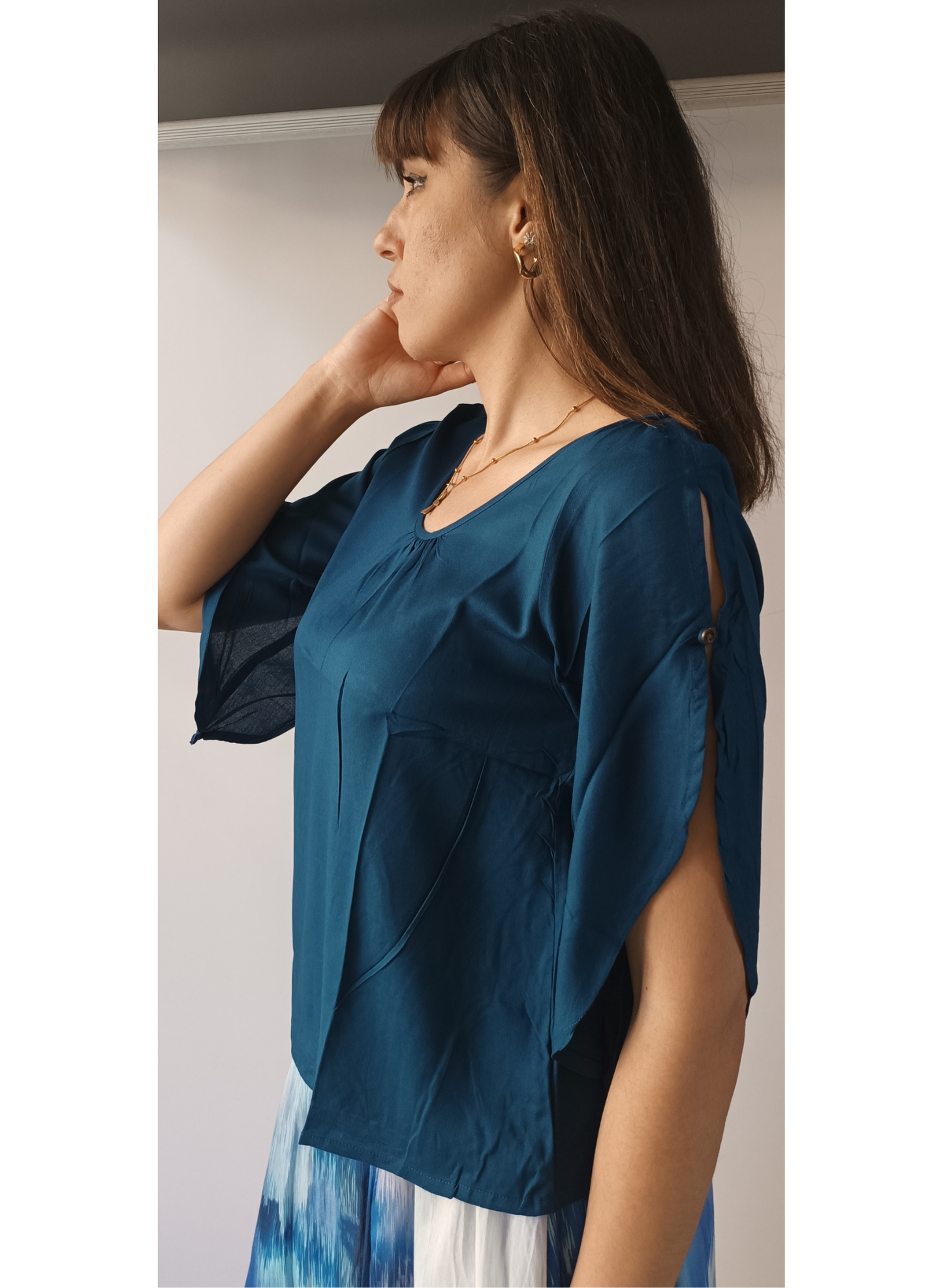 Blusa colore ottanio