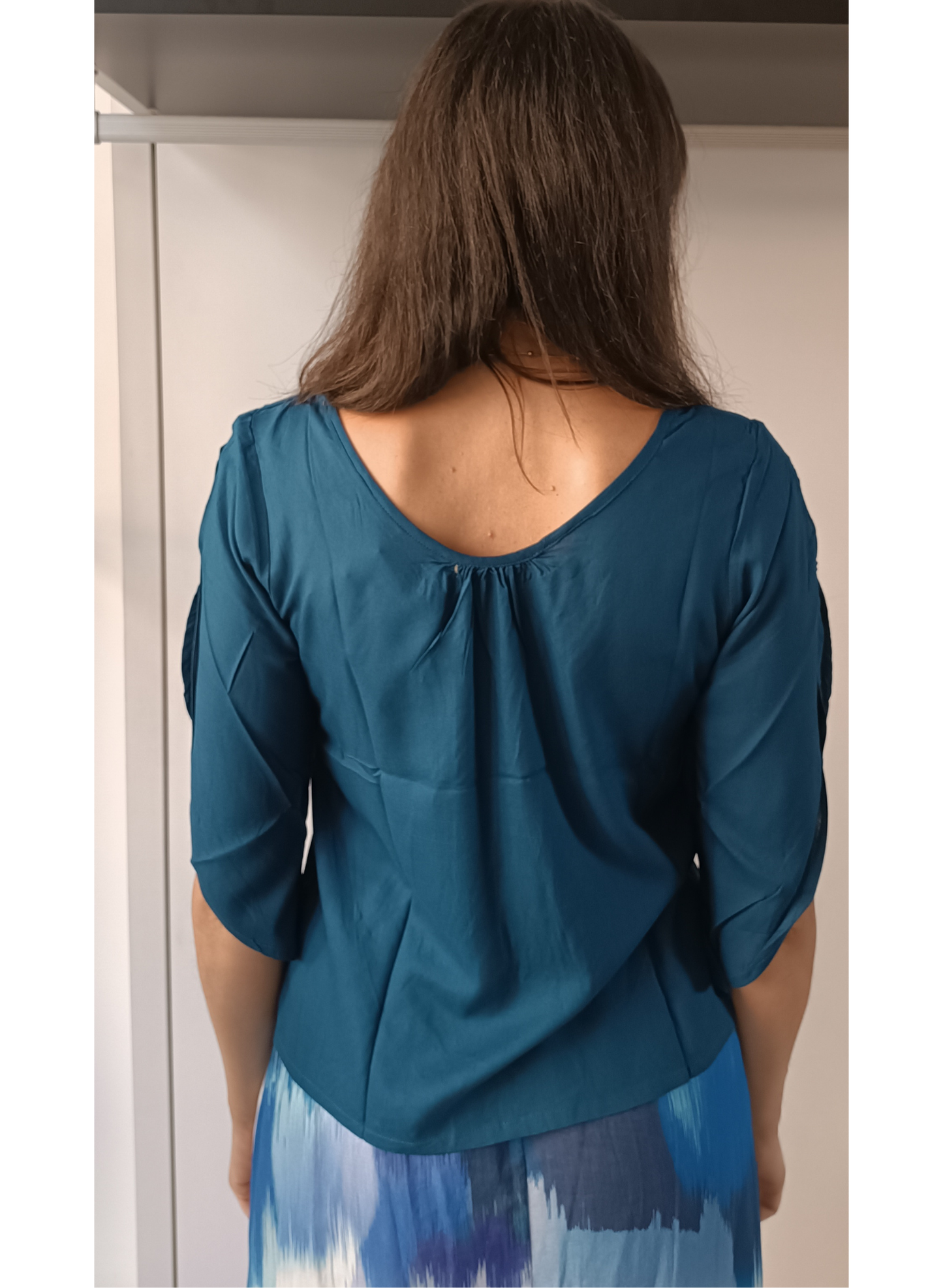 Blusa colore ottanio