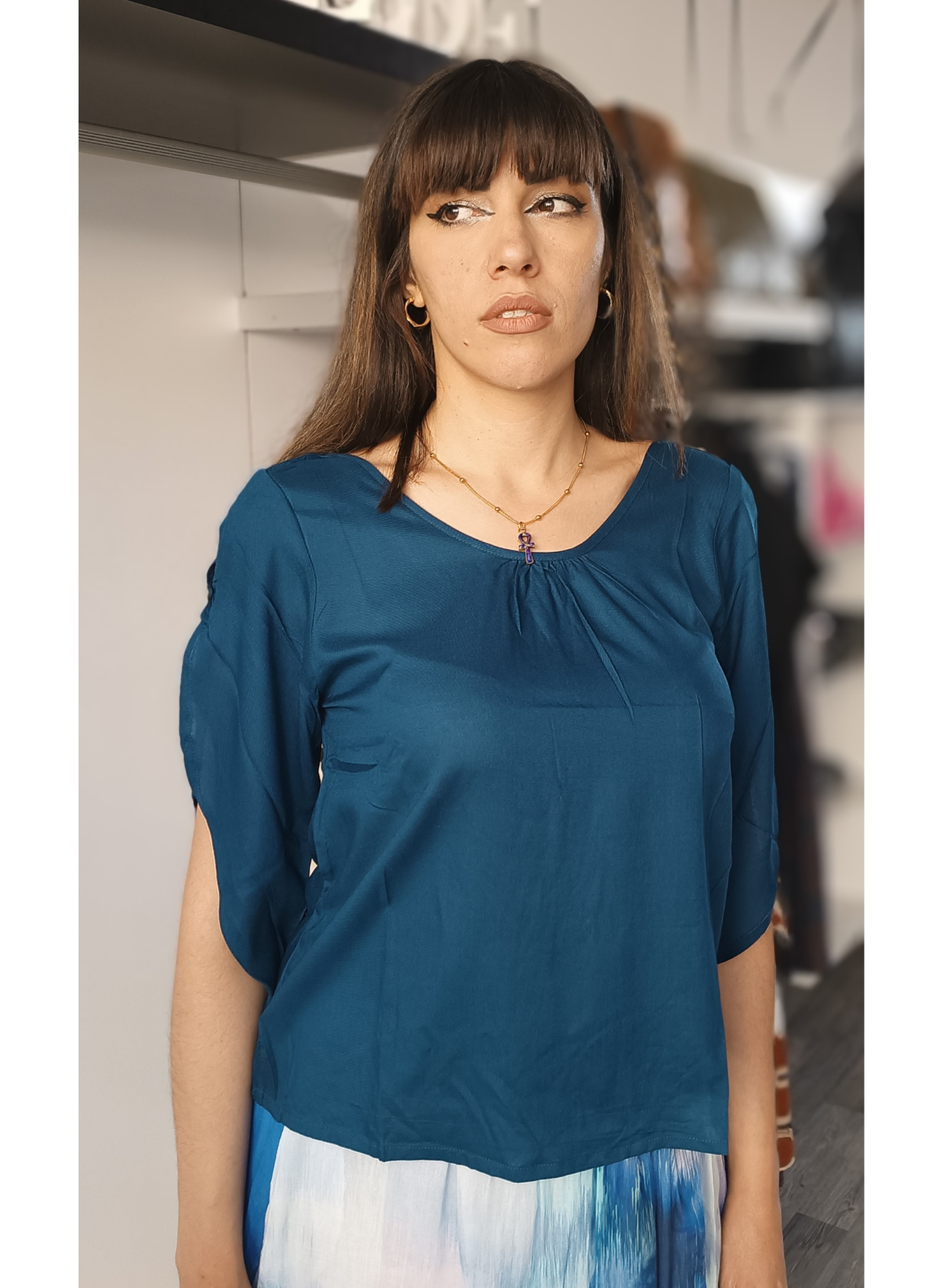 Blusa colore ottanio